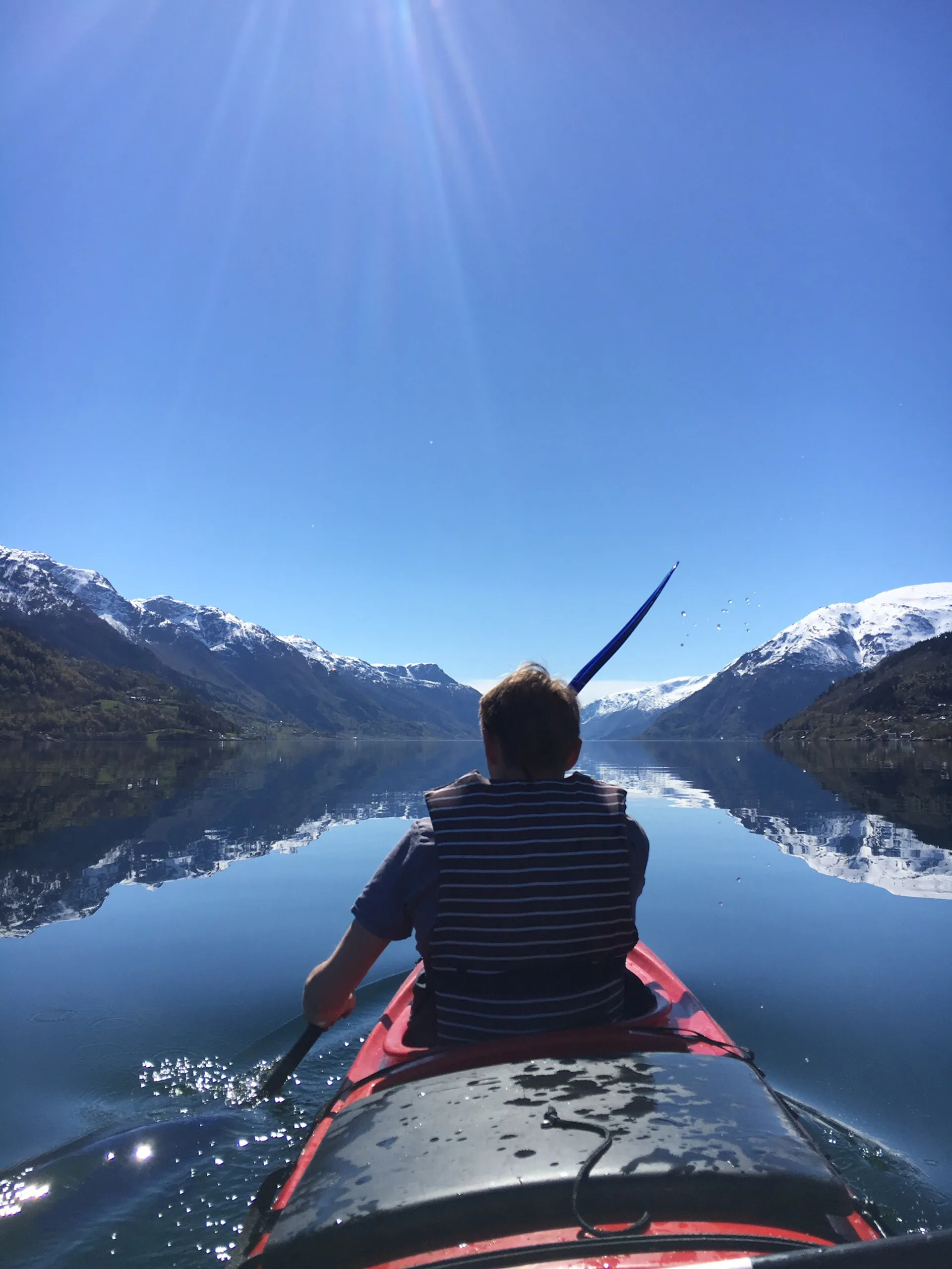 Kayaking on a calm Sørfjord